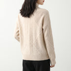 Cable Knit Turtleneck Sweater with Sculpting Fitted Silhouette and Cable-Knit Pattern - angle