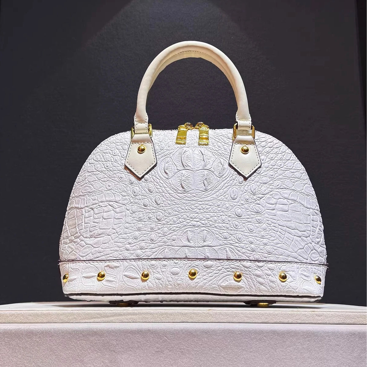 Leather Handbag with Flattering Top Handle and Gold Hardware - Image 6