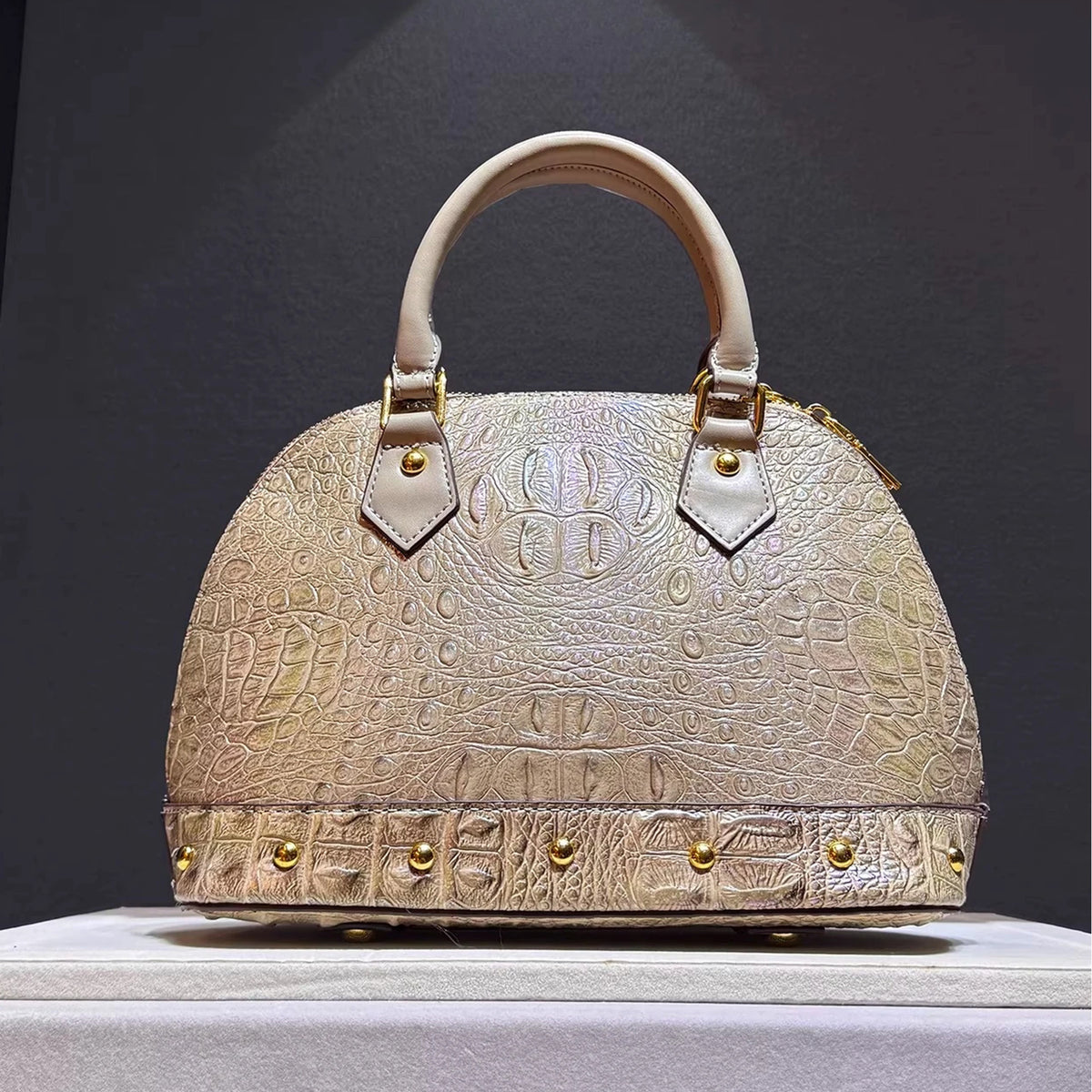Leather Handbag with Flattering Top Handle and Gold Hardware - Image 4