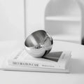 Polished Stainless Steel Fruit Bowl With Modern Open Design - Image 2