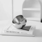 Polished Stainless Steel Fruit Bowl With Modern Open Design - Image 2