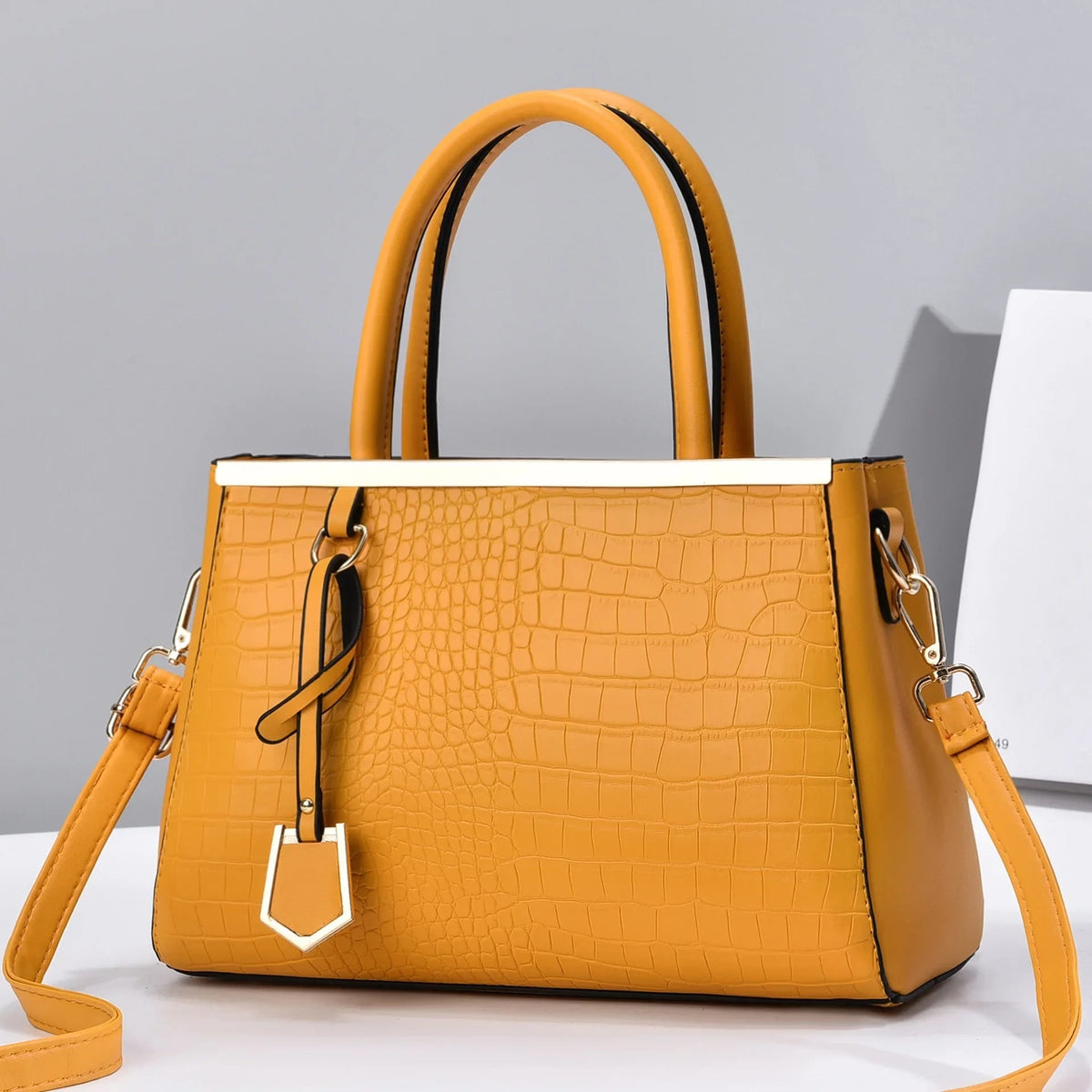 Structured Handbag with Croc-Embossed Leather Silhouette and Hardware - Image 4