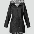 Women's Raincoat with Adjustable Hood and Button-Front - Image 1